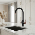 Modern kitchen with black faucet and marble countertop